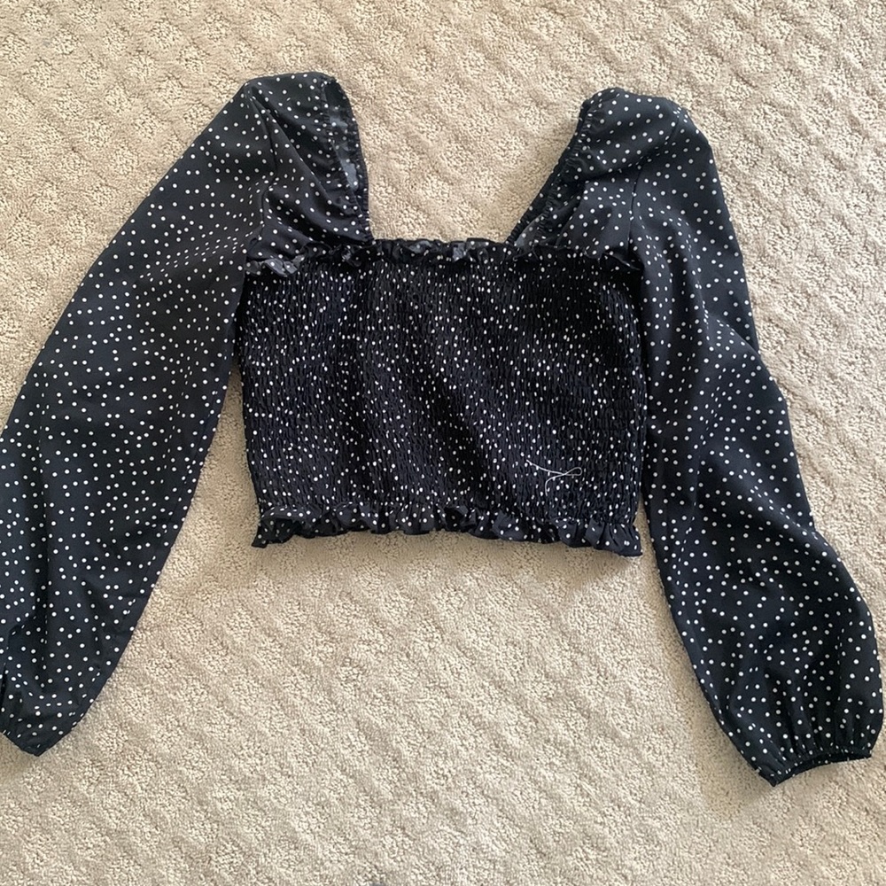 Bunched top with puffy sleeves, light material only worn once in great condition